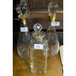 Pair of bulbous Glass Decanters with gold rims and a gold detailed decanter (3)