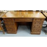 Kneehole Mahogany Writing Desk, late 19thC, the rimmed top over a central drawer, with four short
