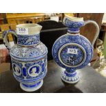 Two German Pottery Ewers, blue ground, decorated in relief with lions and busts of Roman leaders