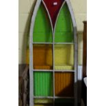 Pine framed gothic arched window panel, with multiple colour glass inserts, 75”h x 24”w