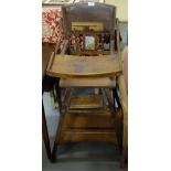 Edw Walnut folding Child’s High Chair with games table, leather padded back.