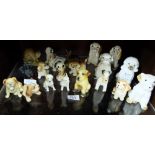 Selection of miniature pottery dog figurines.
