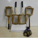 4 wooden tennis rackets with guards & group of tennis balls in a blue net (5)