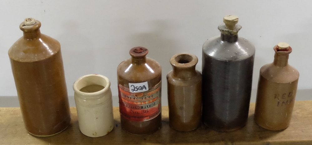 6 Stoneware Ink Bottles, mainly brown, 1 with label “Stephens”