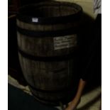 “Poitin” Barrel with metal bands and 4 stoneware whiskey jars marked “poitin”