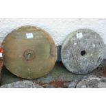 2 sandstone sharpening stones, 24” & 21” diameters