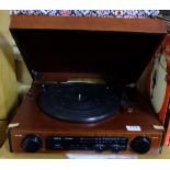 Modern electric Record Player (working), 2 boxes of records and 2 cased tape cases with tapes