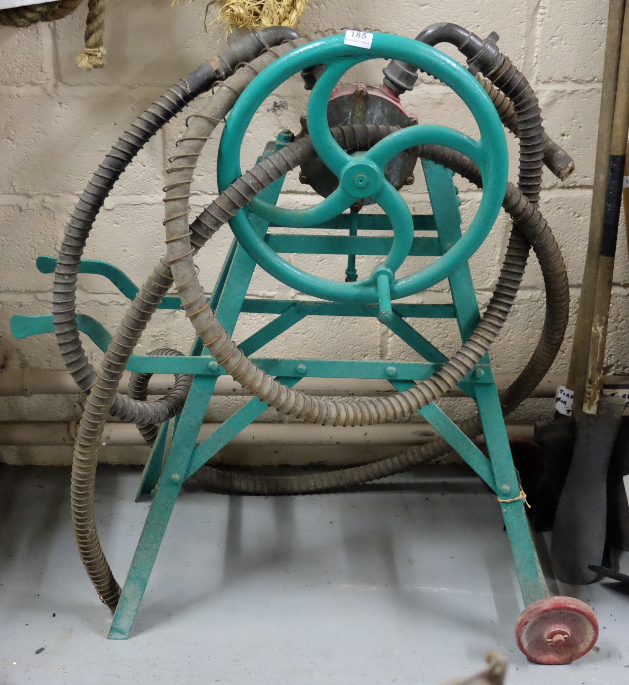 Portable Syphoning Pump, on cast iron stand, painted green