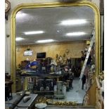 Large 19th C gilded frame Wall Mirror, 100”h x 90”w, with various gilded and carved floral design