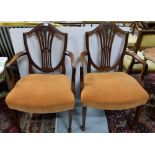 Pair of Edwardian Mahogany Carvers, shield back Hepplewhite design, on reeded front legs, padded