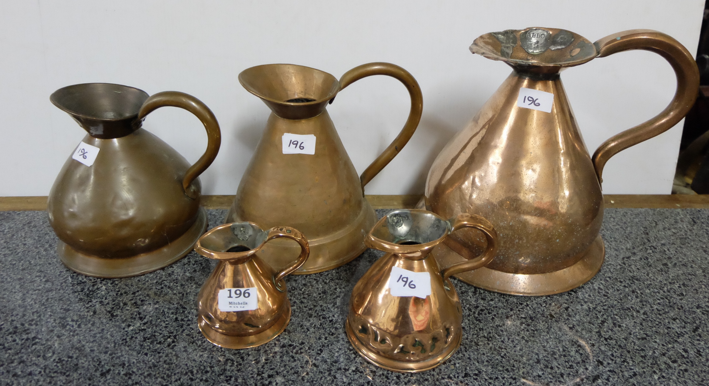 5 antique copper Measuring Jugs (including set of 3, polished)