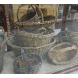 9 old wicker baskets, with handles.