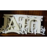 Group of plastic letters of the alphabet, some 15”h, some 4”h