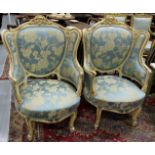 Matching Pair of French High-back Armchairs, painted cream with gold highlights and curved arms,