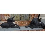 Similar Pair of Cast Iron Fire Dogs - one in the form of a Lion (28”w x 15”h) & one a seated