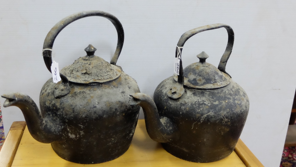 2 metal kettles with lids