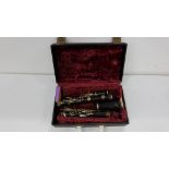 Clarinet with silver plate mounts, in carrying case