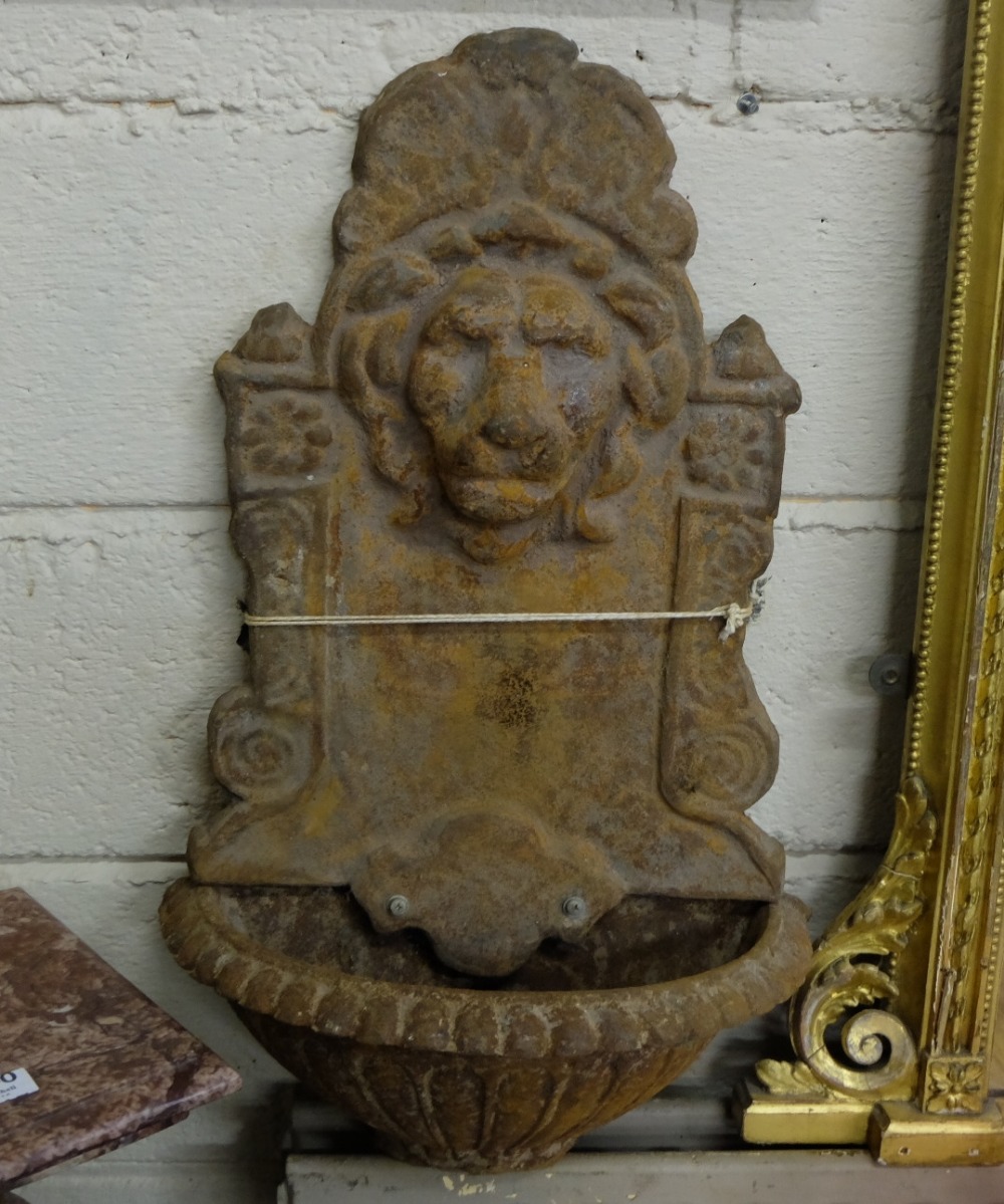 Matching Pair of Cast Iron Wall Fountains, featuring lion masks, 26”h x 15”w