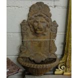 Matching Pair of Cast Iron Wall Fountains, featuring lion masks, 26”h x 15”w