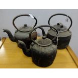 3 small metal kettles with lids
