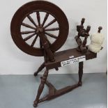 Pine spinning wheel, painted brown “1930” (damaged)