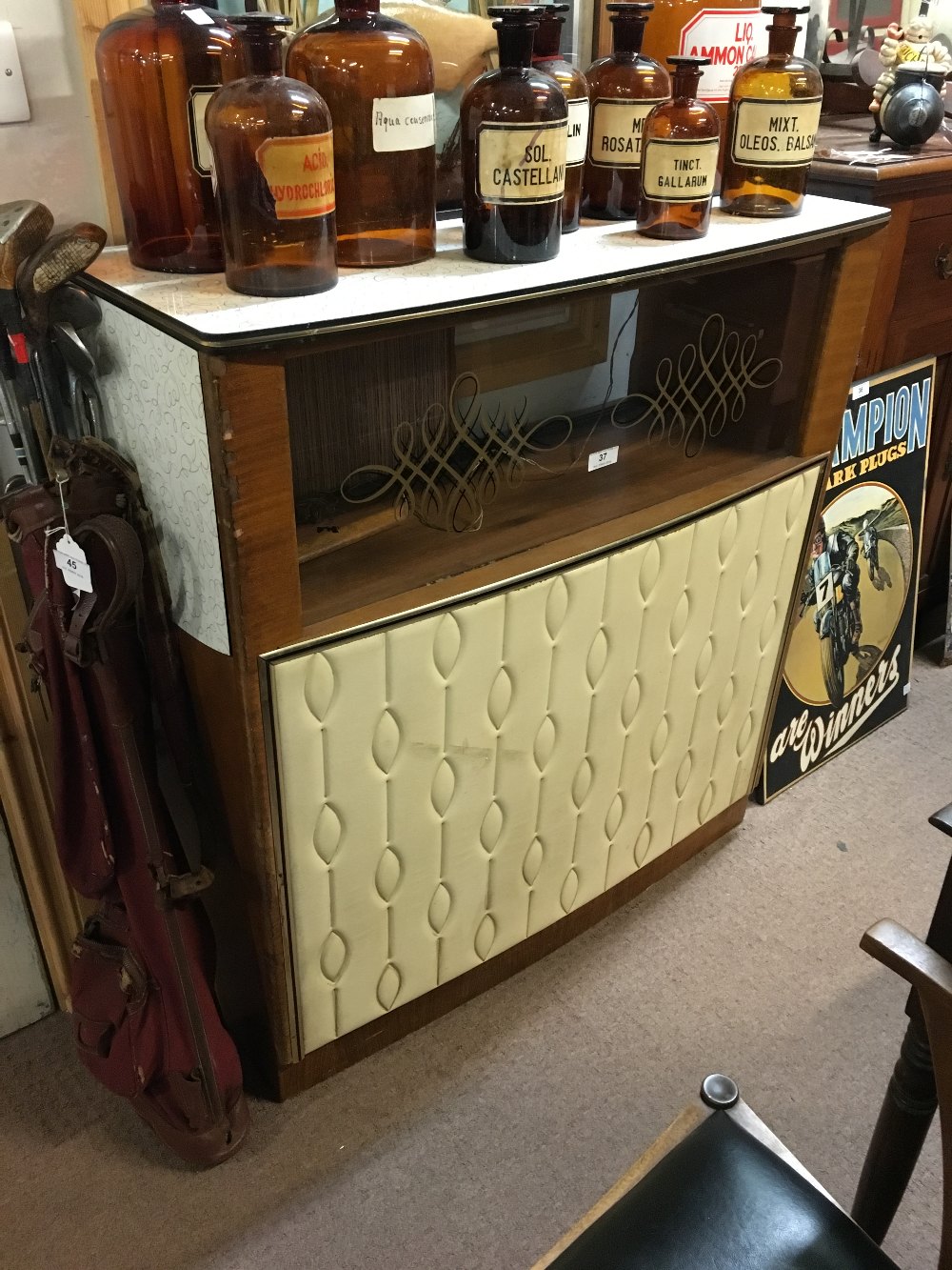 1970's walnut cocktail bar in the Retro style.