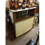 1970's walnut cocktail bar in the Retro style.