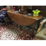 Georgian mahogany double drop leaf table { 150cm L }.