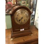 Victorian oak and brass mantle clock.