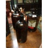 Two Demi Johns bottles and a chemist bottle.