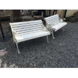 Pair of cast iron and wood garden seats.