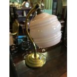 Brass Art Deco desk lamp with pink glass.