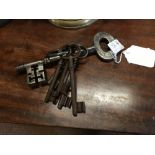Large 19th. C. key and collection of other keys.