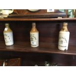 Three 19th. C. ginger beer bottles - Andrew Watt Londonderry Patton Londonderry & Osborne.