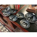 Set of seven 1960's plates depicting fishermen.