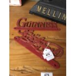 Cast iron GUINNESS & ARTHUR GUINNESS signs.