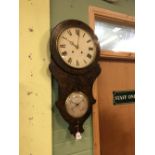 Unusual 19th. C. ebonised walnut shaped drop dial wall clock with barometer POLLOCK & CO Dublin.