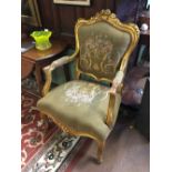 Pair of 20th. C. gilt armchairs with tapestry upholstered seats.