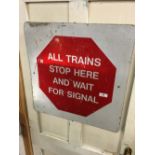 ALL TRAINS STOP HERE AND WAIT FOR SIGNAL metal sign.