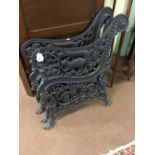 Set of 19th. C. cast iron garden seat ends with the addition of central support.