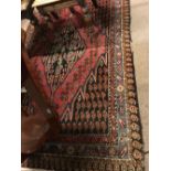 Persian rug { 194cm L X 131cm W }.