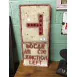 Original cast iron JUNCTION LEFT road sign with ruby glass dots.