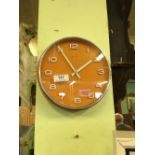 1970's perspex and chrome wall clock.