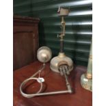 Two chrome and brass Tilley lamps.