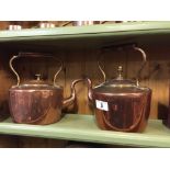 Two copper kettles.