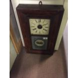 19th C. American walnut wall clock with central painted panel.