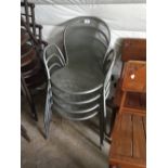 Set of four metal café chairs.