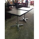 Pair of chrome café tables.