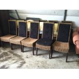 Set of ten wicker dining chairs.