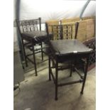 Pair of metal industrial bar stools.